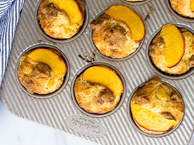 Peach Muffins with Cream Glaze